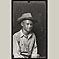Young Boy from Side in Hat