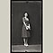 Woman in Polka Dot Dress with White Purse