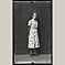 Older Woman in Flower Dress and Glasses