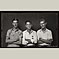 Three Brothers with Crossed Arms
