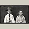 Two Young Boys, in a Fedora and a Garrison Cap