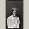 Young Man in Straw Hat Smiling